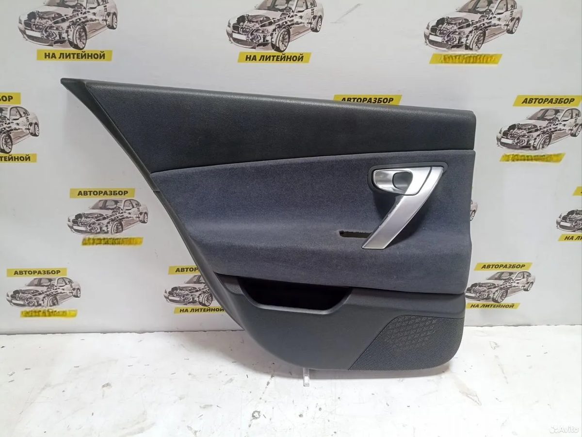 Обшивка двери задняя левая Nissan Primera P12
