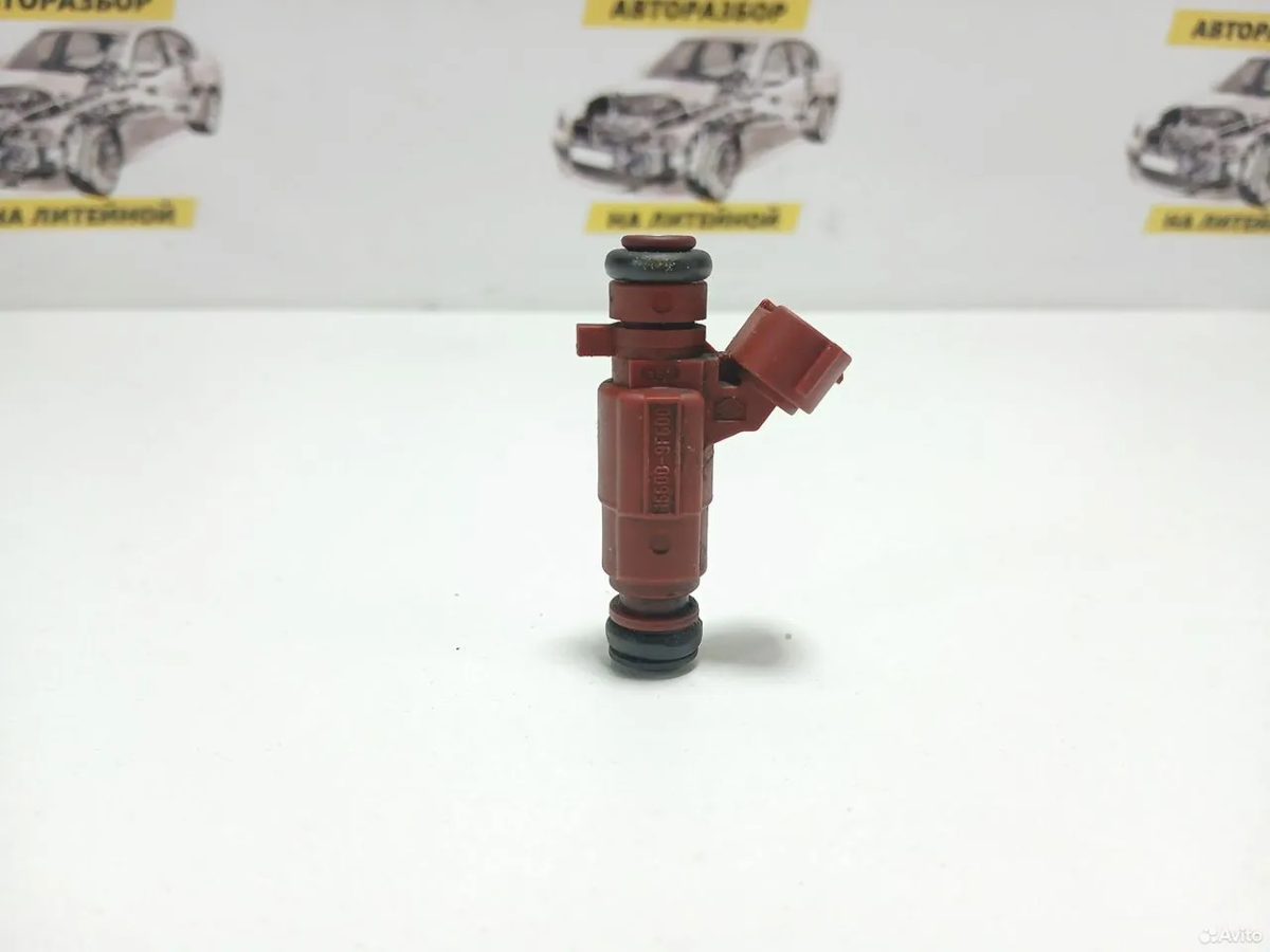 Форсунка топливная Nissan Primera P12