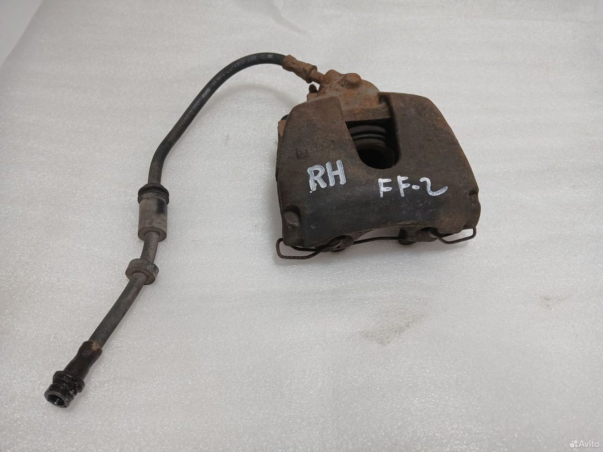 Суппорт передний правый Ford Focus 2